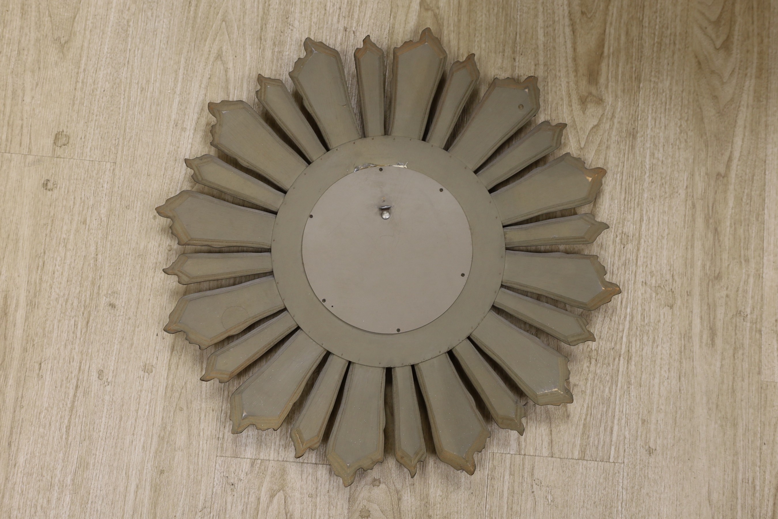 A gilt wood sunburst convex wall mirror, 64cm